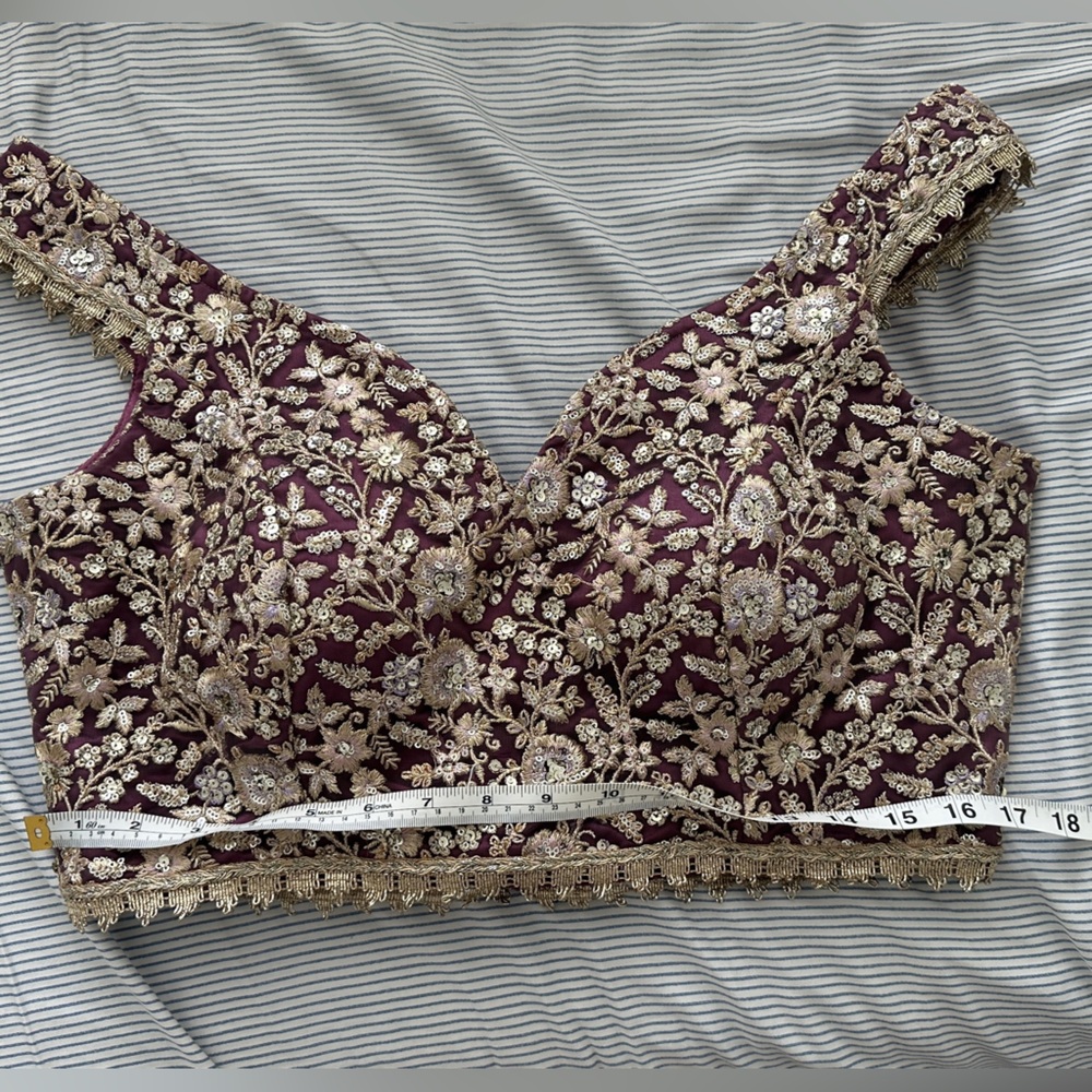 Embroidered Purple saree blouse from lashkara